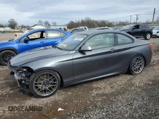 2016 BMW 2 Series M235i with VIN WBA1J7C52GV360723, listed as a Copart auction lot 51990975 with 77,374 mi miles and Salvage title. Bid and sale history available at DreamBid. Image 1.