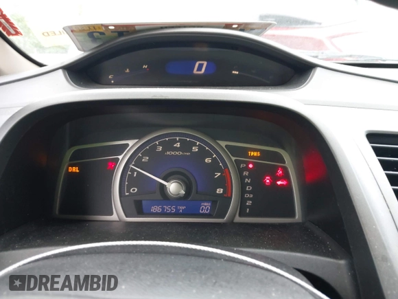2010 Honda Civic LX with VIN 19XFA1F58AE086425, listed as a IAAI auction lot 42225137 with 186,755 mi miles and . Bid and sale history available at DreamBid. Image 7.