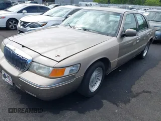 2001 Mercury Grand Marquis LS z VIN 2MEFM75W11X610723, wystawiony jako IAAI lot #42208567 z przebiegiem 190 397 mil mil oraz . Historia ofert i sprzedaży dostępna na DreamBid. Obrazek 2.