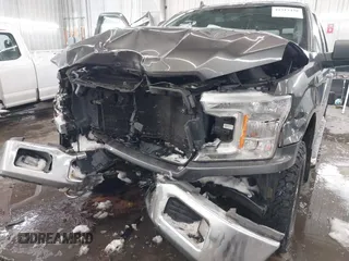 2018 Ford F-150 XL with VIN 1FTEW1E53JKF58493, listed as a IAAI auction lot 41517438 with 159,483 mi miles. Bid and sale history available at carsss.com. Image 6.