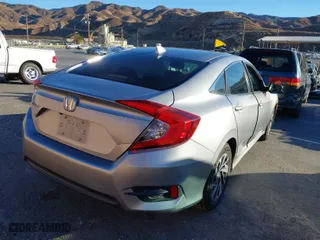 2017 Honda Civic Sedan EX with VIN 19XFC2F74HE204837, listed as a IAAI auction lot 41300160 with 173,241 mi miles. Bid and sale history available at carsss.com. Image 4.