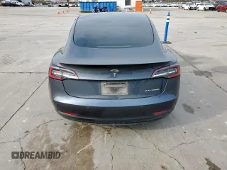 2021 Tesla Model 3 Performance with VIN 5YJ3E1EC5MF850673, listed as a Copart auction lot 47560665 with 96,950 mi miles and Salvage Title. Bid and sale history available at DreamBid. Image 6.