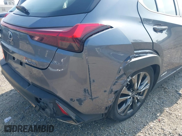 2021 Lexus UX 250h F Sport z VIN JTHE9JBHXM2045377, wystawiony jako IAAI lot #42580566 z przebiegiem 52 838 mil mil oraz . Historia ofert i sprzedaży dostępna na DreamBid. Obrazek 19.