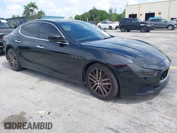2015 Maserati Ghibli with VIN ZAM57XSA1F1144073, listed as a IAAI auction lot 42770723 with 105,782 mi miles and . Bid and sale history available at DreamBid. Image 1.