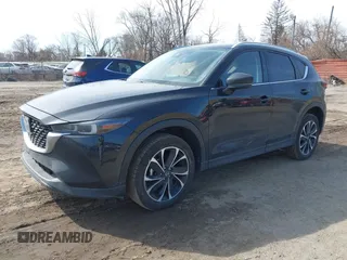 2023 Mazda CX-5 S Premium with VIN JM3KFBDM7P0201038, listed as a IAAI auction lot 41772989 with 26,227 mi miles and . Bid and sale history available at DreamBid. Image 18.
