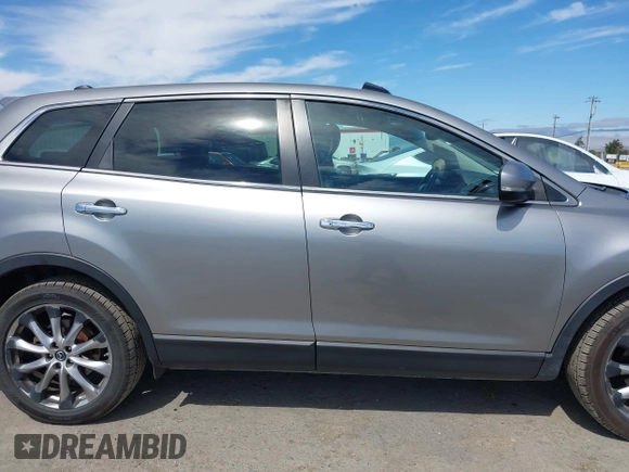 2014 Mazda CX-9 Grand Touring z VIN JM3TB2DVXE0432991, wystawiony jako IAAI lot #42826784 z przebiegiem 134 265 mil mil oraz . Historia ofert i sprzedaży dostępna na DreamBid. Obrazek 13.