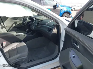 2016 Chevrolet Impala LS with VIN 2G11X5SA2G9170940, listed as a IAAI auction lot 41558728 with 105,990 mi miles. Bid and sale history available at carsss.com. Image 5.