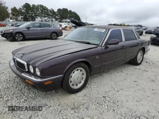 1998 Jaguar XJ with VIN SAJHX1240WC822861, listed as a Copart auction lot 79388654 with 120,568 mi miles and Non Repairable. Bid and sale history available at DreamBid. Image 1.