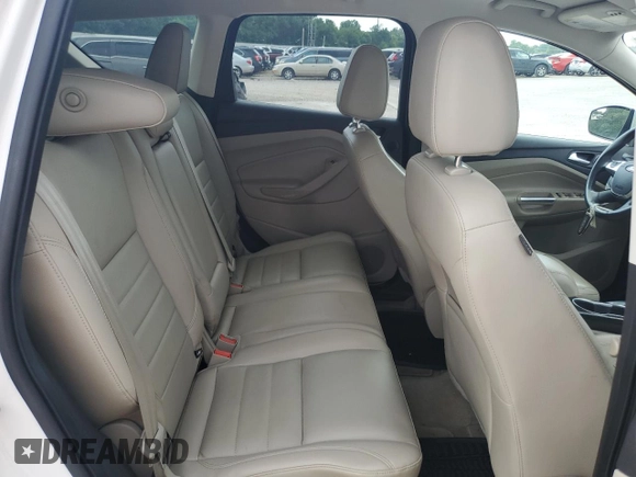 2014 Ford Escape Titanium с VIN 1FMCU0J97EUB15513, выставлен на аукционе Copart как лот 57391715 с пробегом 125 851 миль миль и Списание • Salvage title. История ставок и продаж доступна на DreamBid. Изображение 11.