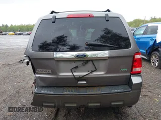 2010 Ford Escape Limited z VIN 1FMCU9EGXAKA70120, wystawiony jako IAAI lot #42330489 z przebiegiem 179 604 mil mil oraz . Historia ofert i sprzedaży dostępna na DreamBid. Obrazek 16.