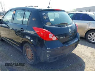 2009 Nissan Versa 1.8 S with VIN 3N1BC13E59L499006, listed as a IAAI auction lot 41953194 with 179,330 mi miles. Bid and sale history available at carsss.com. Image 3.