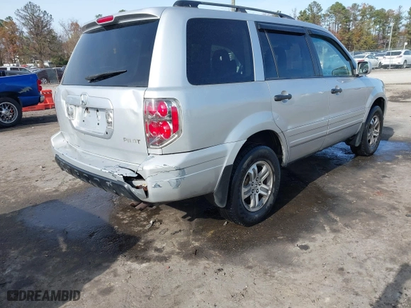 2004 Honda Pilot EX with VIN 2HKYF18634H515163, listed as a IAAI auction lot 40786017 with 206,036 mi miles. Bid and sale history available at carsss.com. Image 4.