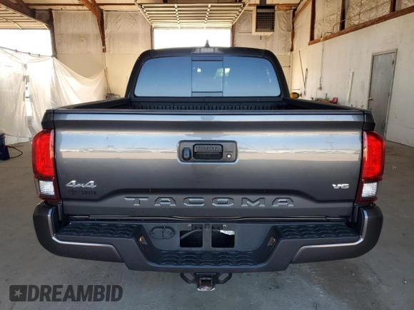 2023 Toyota Tacoma SR z VIN 3TMCZ5AN4PM599664, wystawiony jako Copart lot #57462455 z przebiegiem 65 736 mil mil oraz Szkoda całkowita • Salvage title. Historia ofert i sprzedaży dostępna na DreamBid. Obrazek 6.