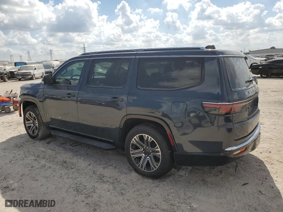 2024 Jeep Wagoneer with VIN 1C4SJVAP9RS114983, listed as a Copart auction lot 77324114 with 22,441 mi miles and Salvage Title. Bid and sale history available at carsss.com. Image 2.
