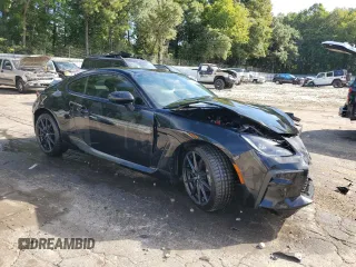 2023 Toyota GR86 Premium with VIN JF1ZNBF12P8765815, listed as a Copart auction lot 69377494 with 5,382 mi miles and Salvage Title. Bid and sale history available at carsss.com. Image 4.