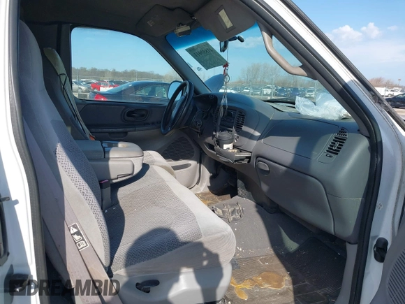 1999 Ford F-150 XL with VIN 2FTRX18L7XCA69231, listed as a IAAI auction lot 41880011 with 1 mi miles. Bid and sale history available at carsss.com. Image 5.