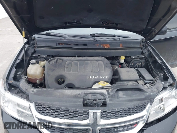 2014 Dodge Journey SXT with VIN 3C4PDCBG9ET259028, listed as a IAAI auction lot 41400287 with 192,979 mi miles and . Bid and sale history available at DreamBid. Image 10.