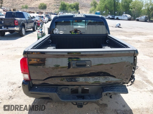 2023 Toyota Tacoma SR with VIN 3TMCZ5AN1PM654572, listed as a IAAI auction lot 42312575 with 14,111 mi miles and . Bid and sale history available at DreamBid. Image 16.
