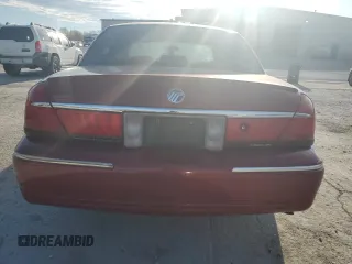2000 Mercury Grand Marquis LS z VIN 2MEFM75W9YX641907, wystawiony jako Copart lot #50722975 z przebiegiem 152 108 mil mil oraz Szkody całkowita. Historia ofert i sprzedaży dostępna na DreamBid. Obrazek 6.