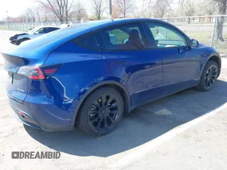 2022 Tesla Model Y Long Range with VIN 7SAYGDEE3NF449873, listed as a IAAI auction lot 41900271 with 38,571 mi miles and . Bid and sale history available at carsss.com. Image 4.