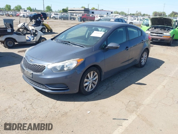2015 Kia Forte LX with VIN KNAFX4A61F5354649, listed as a IAAI auction lot 42040586 with 113,436 mi miles. Bid and sale history available at carsss.com. Image 2.