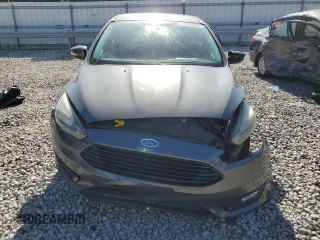 2016 Ford Focus SE with VIN 1FADP3FE8GL381855, listed as a Copart auction lot 57366645 with 104,709 mi miles and Salvage title. Bid and sale history available at DreamBid. Image 5.