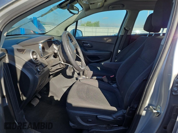 2015 Chevrolet Trax LS with VIN 3GNCJPSB7FL212690, listed as a Copart auction lot 54598765 with 103,676 mi miles and Salvage Title. Bid and sale history available at DreamBid. Image 7.