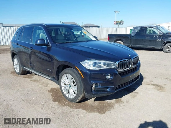 2016 BMW X5 sDrive35i with VIN 5UXKR2C55G0R71330, listed as a IAAI auction lot 41661140 with 128,457 mi miles. Bid and sale history available at carsss.com. Image 1.