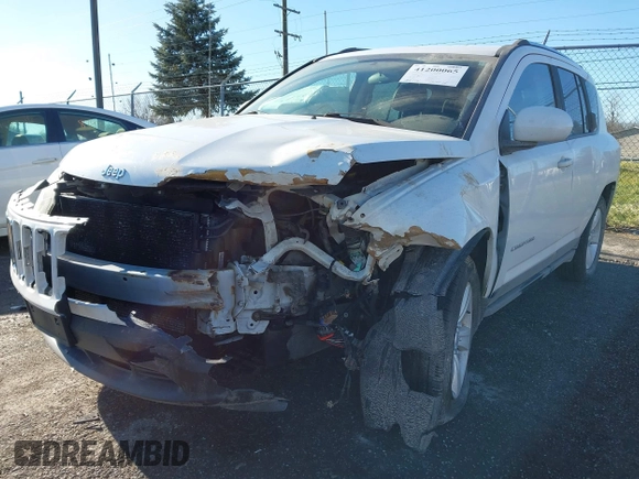 2014 Jeep Compass Latitude with VIN 1C4NJCEB0ED660019, listed as a IAAI auction lot 41200065 with 185,174 mi miles. Bid and sale history available at carsss.com. Image 6.