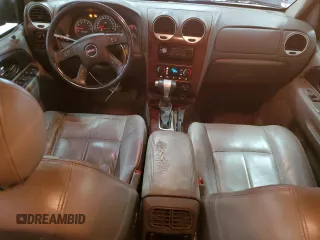 2007 GMC Envoy SLE z VIN 1GKDS13S172279038, wystawiony jako Copart lot #55883635 z przebiegiem 208 794 mil mil oraz Tytuł czysty. Historia ofert i sprzedaży dostępna na DreamBid. Obrazek 8.