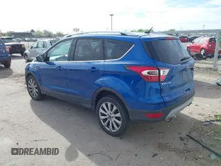 2017 Ford Escape Titanium with VIN 1FMCU0JD1HUA30076, listed as a IAAI auction lot 42024777 with 110,467 mi miles. Bid and sale history available at carsss.com. Image 3.