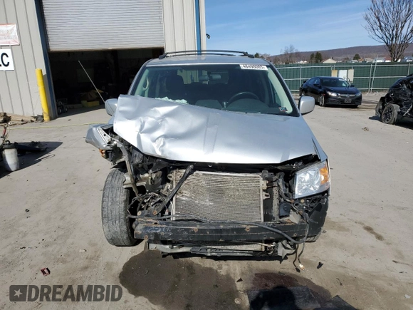 2010 Dodge Grand Caravan Crew with VIN 2D4RN6DX3AR435026, listed as a Copart auction lot 48490085 with 179,114 mi miles and Salvage Title. Bid and sale history available at DreamBid. Image 5.