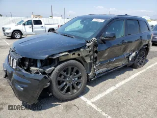 2020 Jeep Grand Cherokee Laredo with VIN 1C4RJFAGXLC274893, listed as a Copart auction lot 59941875 with 60,127 mi miles and Salvage title. Bid and sale history available at DreamBid. Image 1.