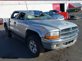 2004 Dodge Dakota SLT with VIN 1D7HG48N24S699380, listed as a IAAI auction lot 41436819 with 1 mi miles. Bid and sale history available at carsss.com. Image 1.