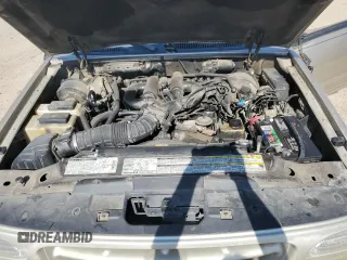 2000 Ford Explorer Sport with VIN 1FMYU60E3YUA95157, listed as a Copart auction lot 77214804 with 322,604 mi miles and Salvage title. Bid and sale history available at DreamBid. Image 12.