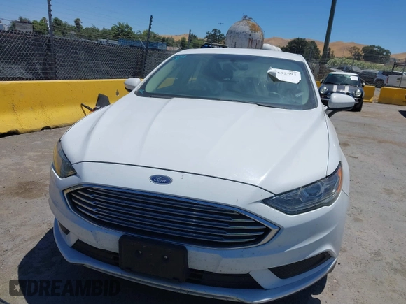 2017 Ford Fusion Hybrid SE with VIN 3FA6P0LU3HR326980, listed as a IAAI auction lot 42692591 with 141,122 mi miles and . Bid and sale history available at DreamBid. Image 12.
