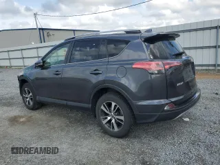 2018 Toyota RAV4 XLE with VIN JTMRFREV2JJ215776, listed as a Copart auction lot 51745205 with 52,009 mi miles and Salvage Title. Bid and sale history available at DreamBid. Image 2.