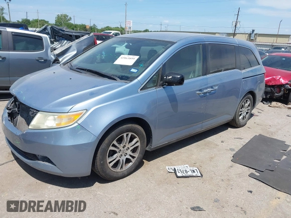2013 Honda Odyssey EX z VIN 5FNRL5H4XDB062760, wystawiony jako IAAI lot #42063899 z przebiegiem 181 658 mil mil oraz . Historia ofert i sprzedaży dostępna na DreamBid. Obrazek 18.