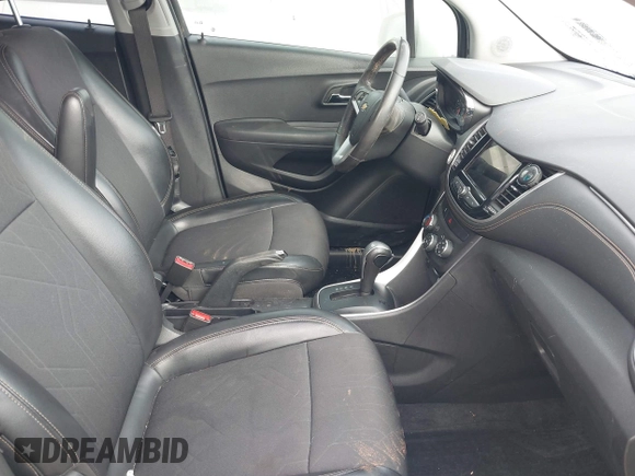 2019 Chevrolet Trax LT z VIN KL7CJLSBXKB917249, wystawiony jako IAAI lot #41225281 z przebiegiem 113 842 mil mil oraz . Historia ofert i sprzedaży dostępna na DreamBid. Obrazek 5.