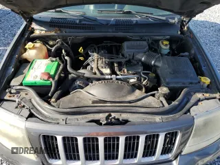 2004 Jeep Grand Cherokee Laredo z VIN 1J4GW48S14C350441, wystawiony jako Copart lot #59434415 z przebiegiem 78 449 mil mil oraz Czysty tytuł • Clean title. Historia ofert i sprzedaży dostępna na DreamBid. Obrazek 12.