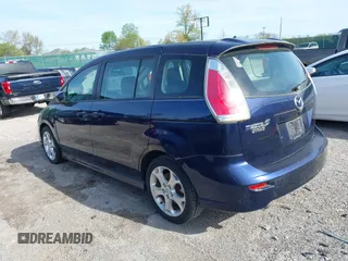 2010 Mazda 5 Sport with VIN JM1CR2W39A0388301, listed as a IAAI auction lot 42077549 with 128,371 mi miles and . Bid and sale history available at DreamBid. Image 3.