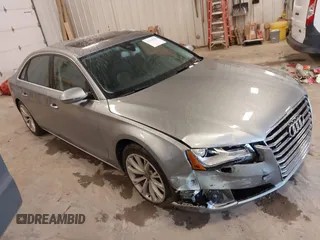 2012 Audi A8 z VIN WAURVAFD7CN021716, wystawiony jako IAAI lot #42330229 z przebiegiem 97 359 mil mil oraz . Historia ofert i sprzedaży dostępna na DreamBid. Obrazek 1.