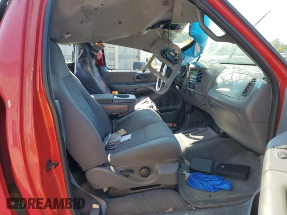 2001 Ford F-150 XL z VIN 2FTRF18W21CA50638, wystawiony jako Copart lot #53474355 z przebiegiem Nie podano mil oraz Nie do naprawy • Non repairable. Historia ofert i sprzedaży dostępna na DreamBid. Obrazek 7.