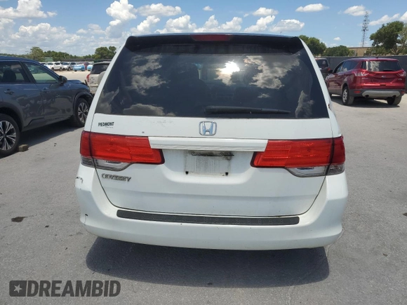 2010 Honda Odyssey LX with VIN 5FNRL3H23AB032112, listed as a Copart auction lot 60876035 with 223,335 mi miles and Salvage title. Bid and sale history available at DreamBid. Image 6.