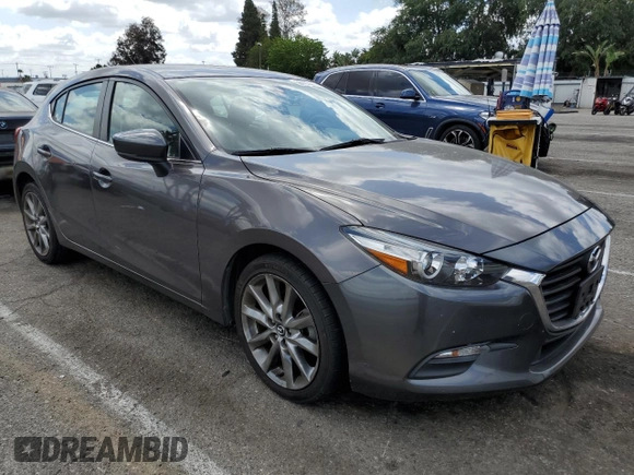 2018 Mazda 3 Touring z VIN 3MZBN1L38JM219466, wystawiony jako Copart lot #56766025 z przebiegiem 124 775 mil mil oraz Szkoda całkowita • Salvage title. Historia ofert i sprzedaży dostępna na DreamBid. Obrazek 4.