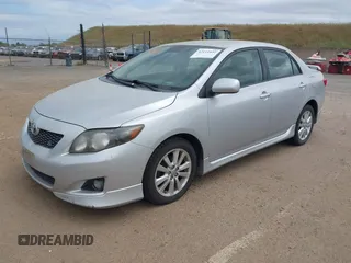 2009 Toyota Corolla with VIN 1NXBU40EX9Z028809, listed as a IAAI auction lot 42111892 with 156,182 mi miles. Bid and sale history available at carsss.com. Image 2.