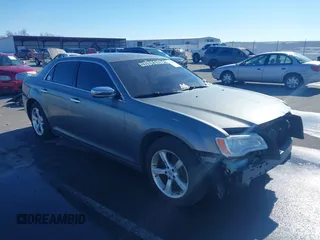 2011 Chrysler 300 with VIN 2C3CA6CTXBH563112, listed as a IAAI auction lot 41374372 with 151,947 mi miles. Bid and sale history available at carsss.com. Image 1.