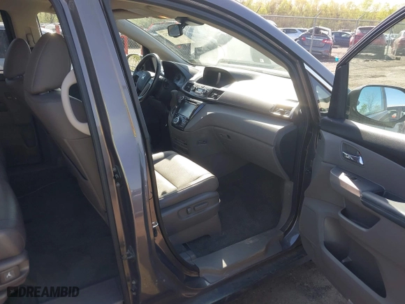 2016 Honda Odyssey EX-L with VIN 5FNRL5H65GB024360, listed as a IAAI auction lot 42005732 with 82,667 mi miles. Bid and sale history available at carsss.com. Image 5.