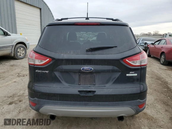 2013 Ford Escape SE with VIN 1FMCU0GXXDUB76102, listed as a Copart auction lot 44226025 with 104,127 mi miles and Salvage Title. Bid and sale history available at DreamBid. Image 6.