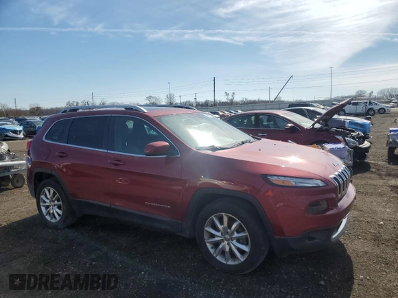 2015 Jeep Cherokee Limited with VIN 1C4PJMDB1FW736756, listed as a Copart auction lot 48815455 with 167,819 mi miles and Salvage Title. Bid and sale history available at DreamBid. Image 4.